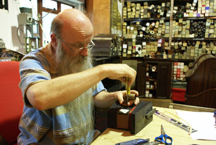 Rex repairing the sustain pneumatic